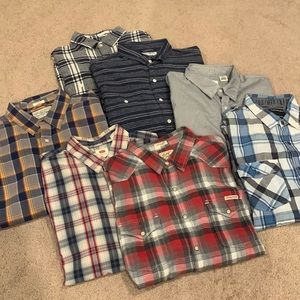 Bundle of long sleeve button down shirts.